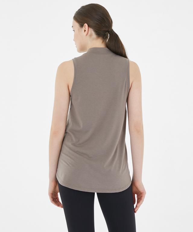 Allegro Tank featuring a stylish half-neck design and unbalanced length for body line concealment.