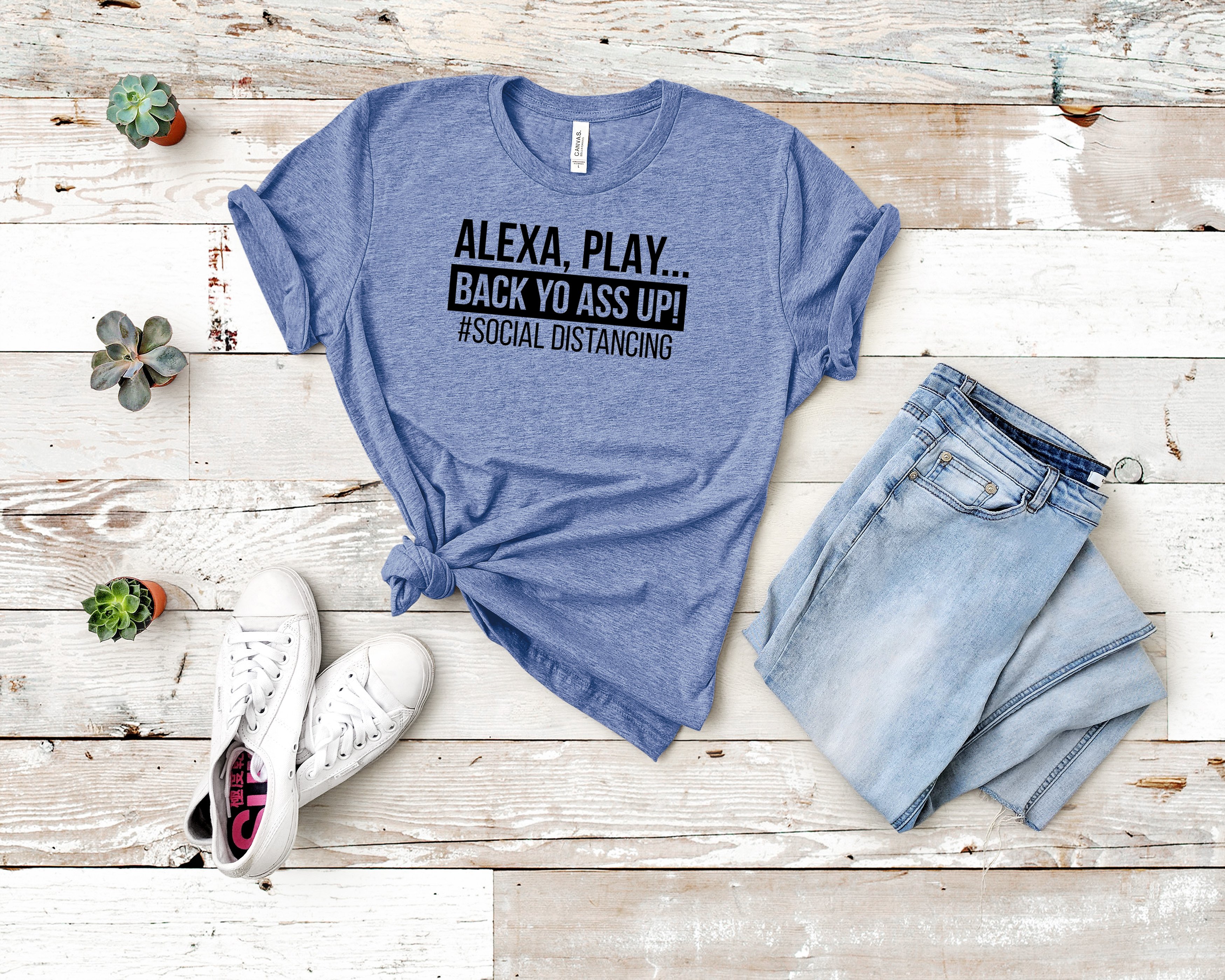 A stylish unisex tee featuring the phrase 'Alexa, Play Back Yo Ass Up' designed for comfort and social distancing.