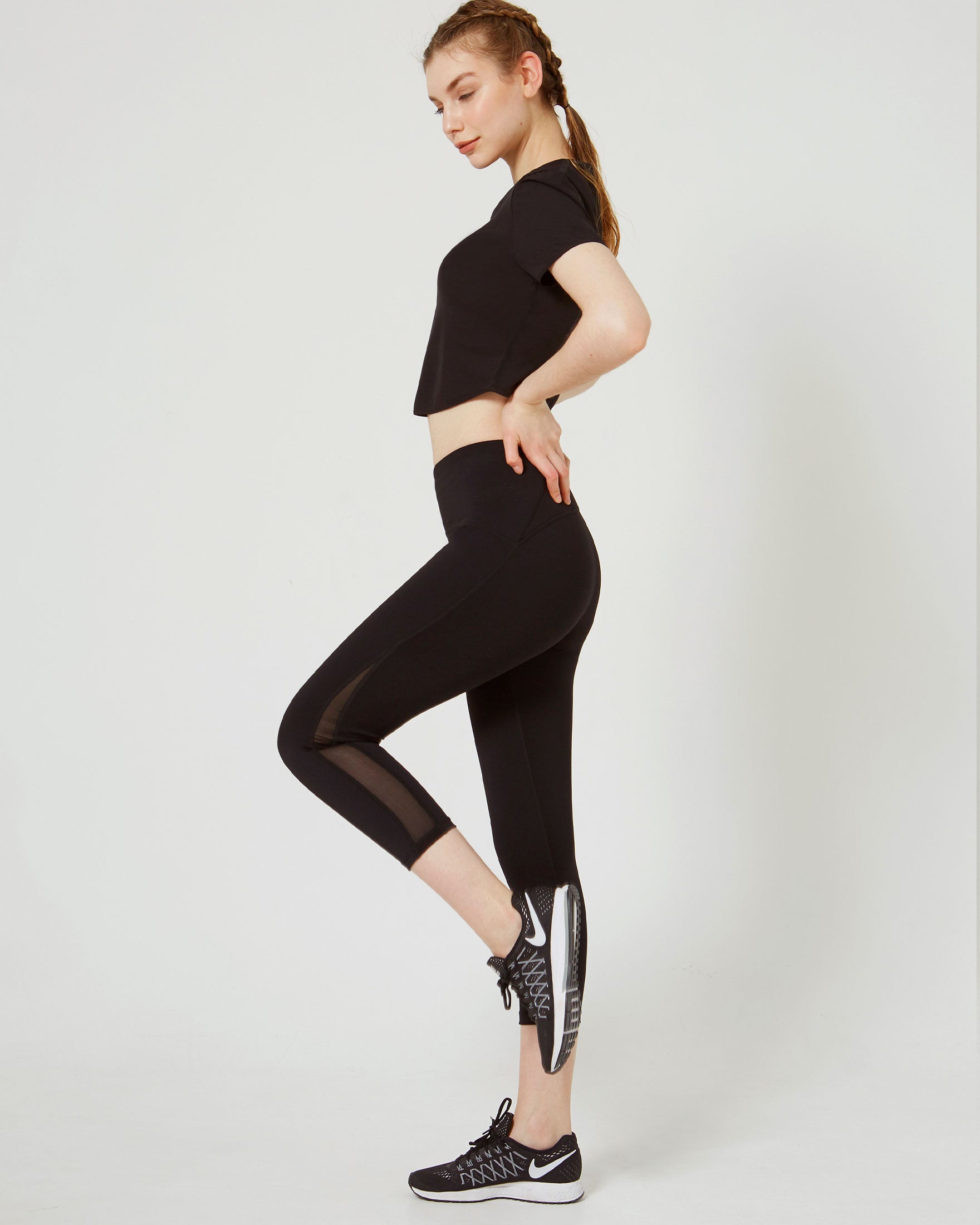 Alliance Ventiflo™ Crop Legging featuring mesh details, small pockets, and high compression fabric for optimal performance.