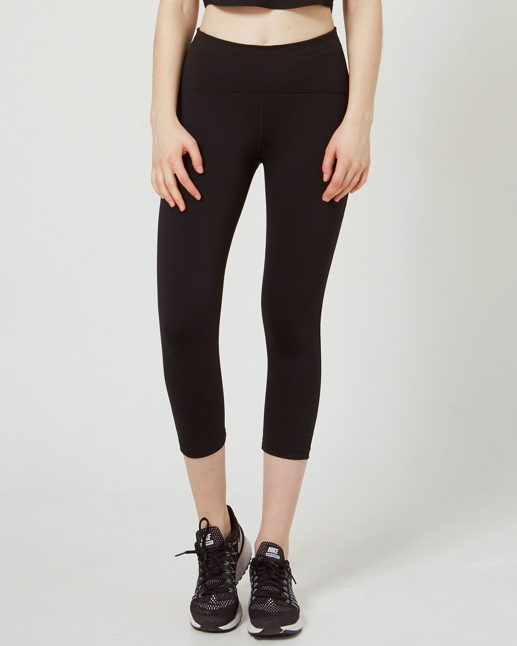 Alliance Ventiflo™ Crop Legging featuring mesh details, small pockets, and high compression fabric for optimal performance.