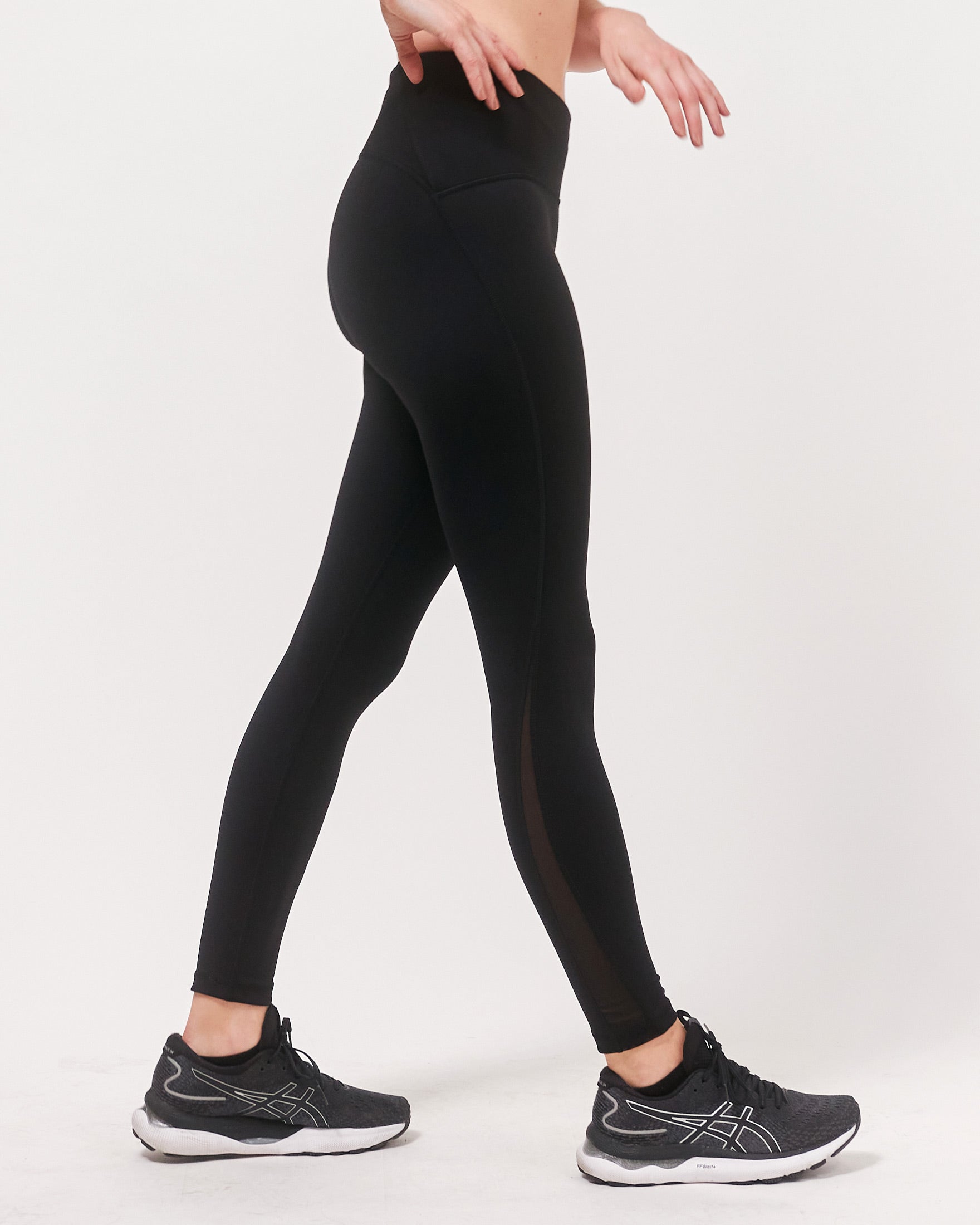 Alliance Ventiflo™ Mesh Leggings featuring breathable mesh sides and small waistband pockets, perfect for running and training.