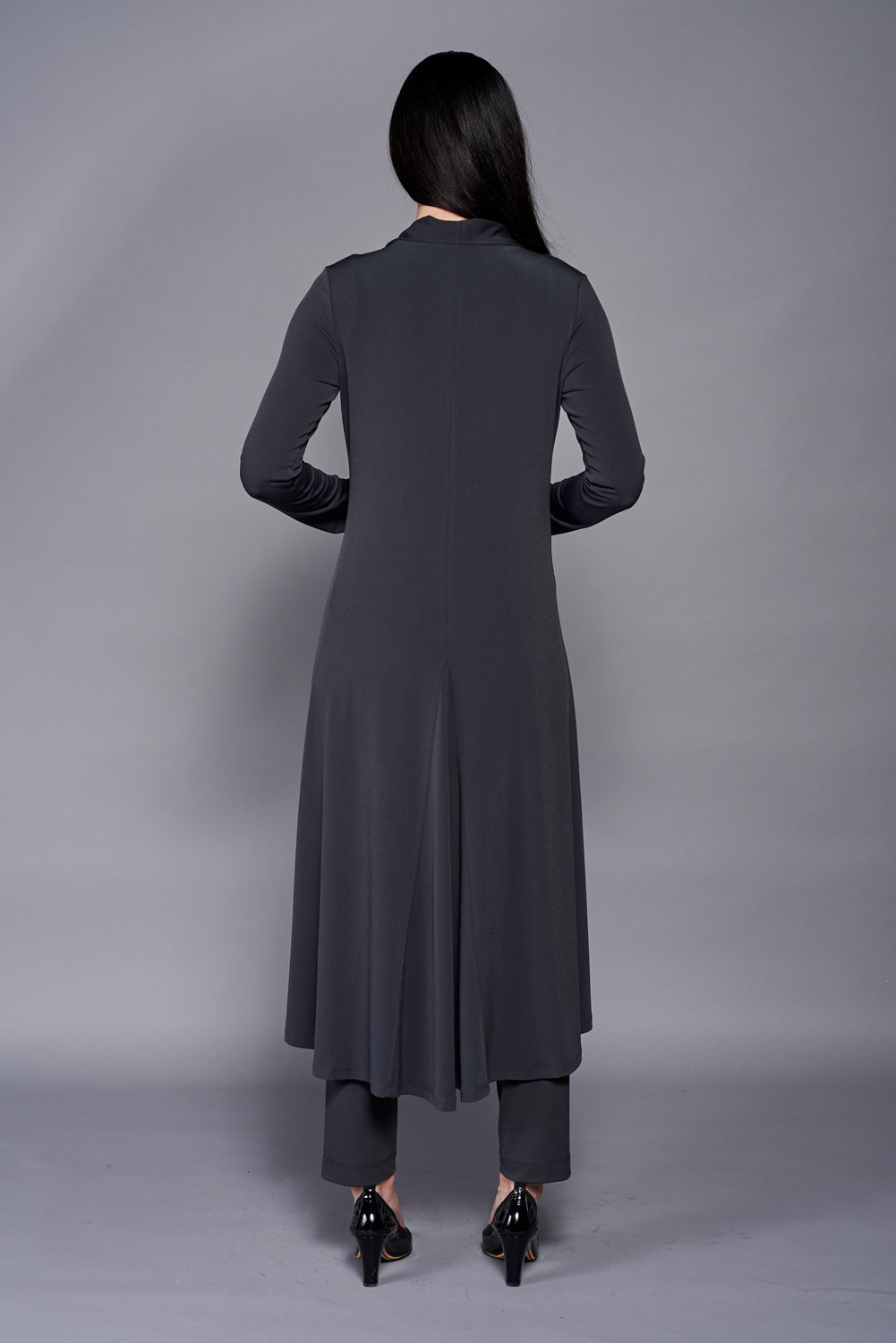 Aline Dress in midi length, showcasing soft stretch knit jersey fabric, perfect for layering.