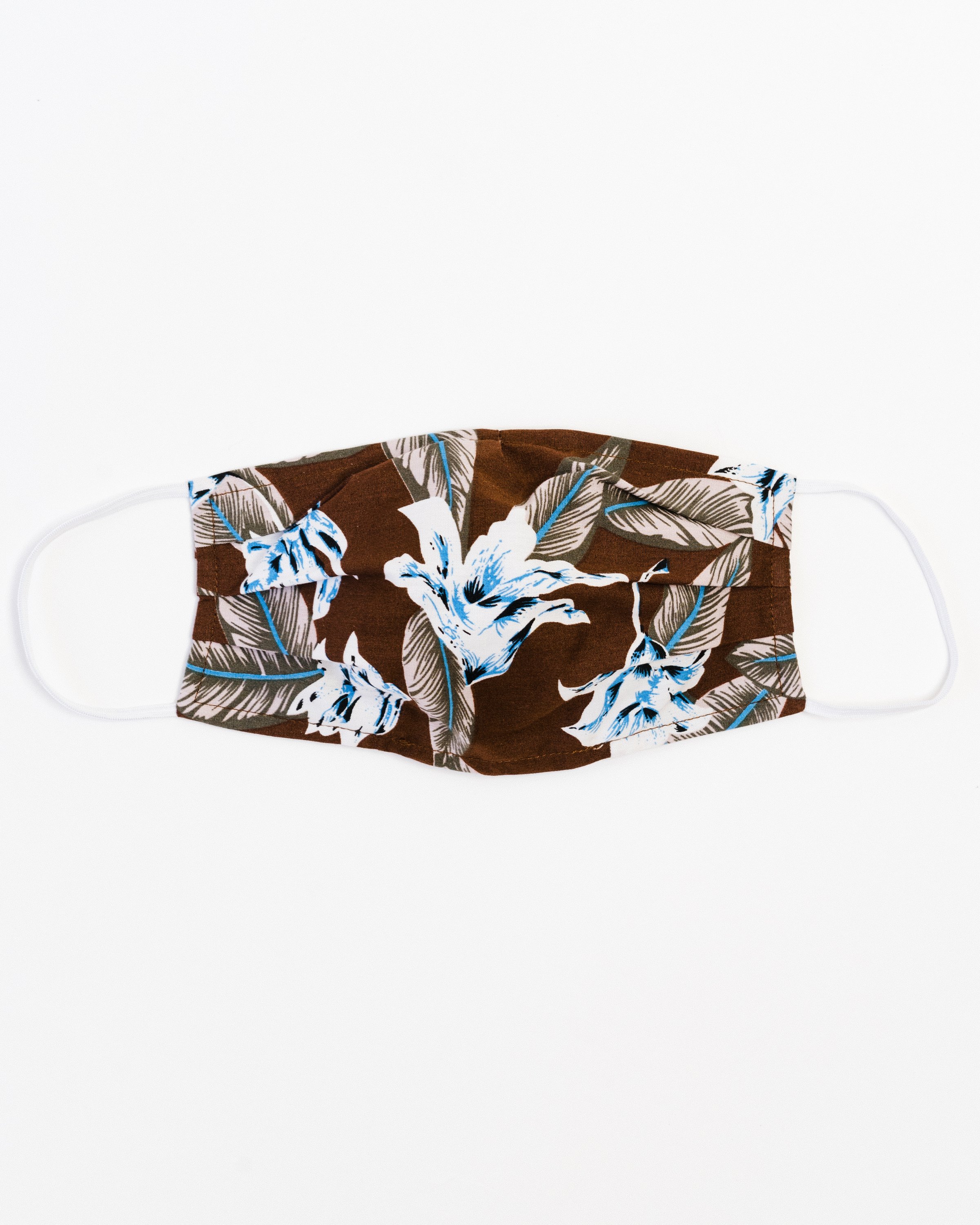 Aloha Face Mask made of breathable cotton with colorful prints, featuring pleats for comfort and a pocket for filters.