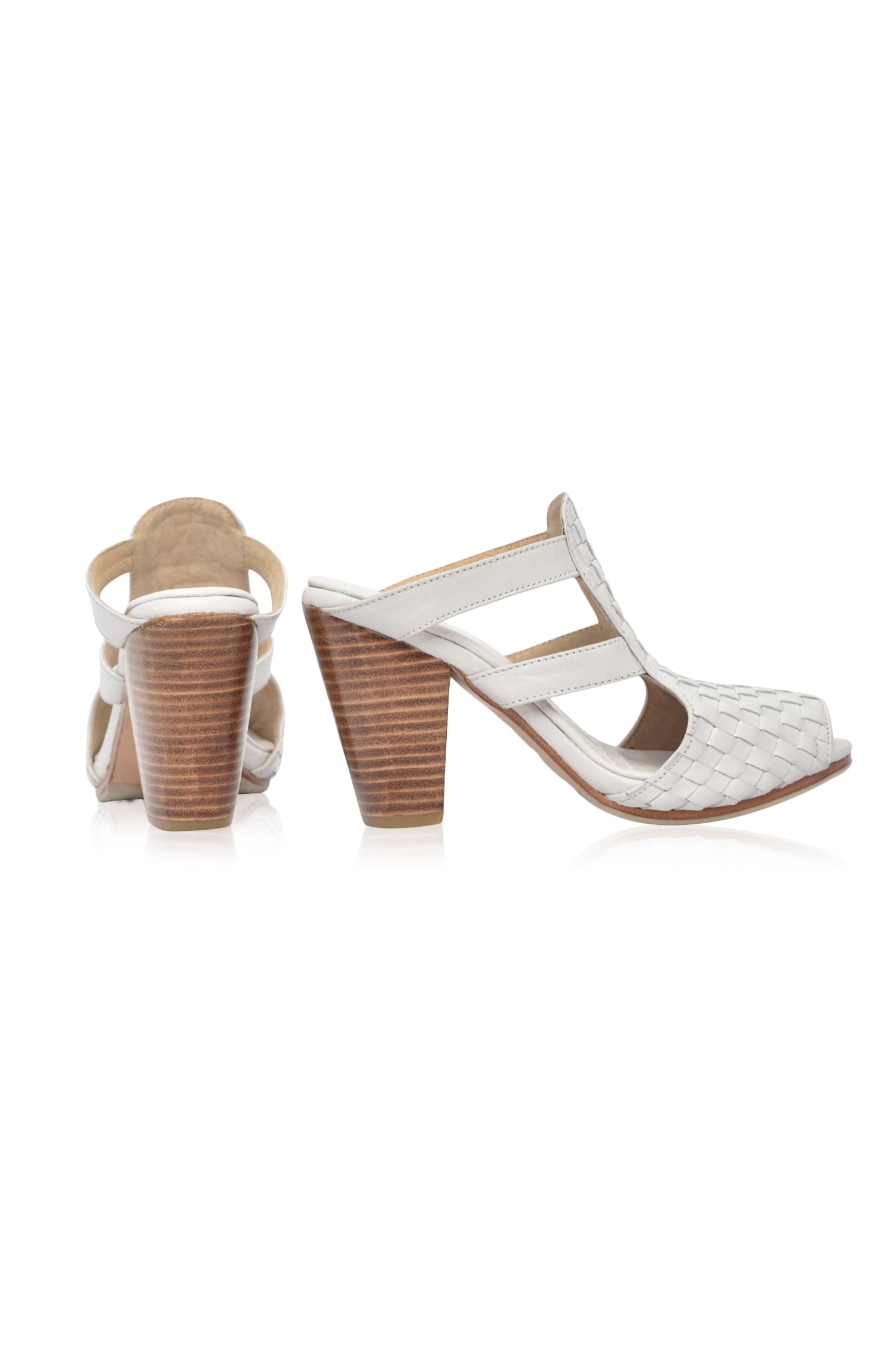 Amane Woven Mules Heels showcasing intricate woven design and chunky wooden heel, perfect for stylish outings.