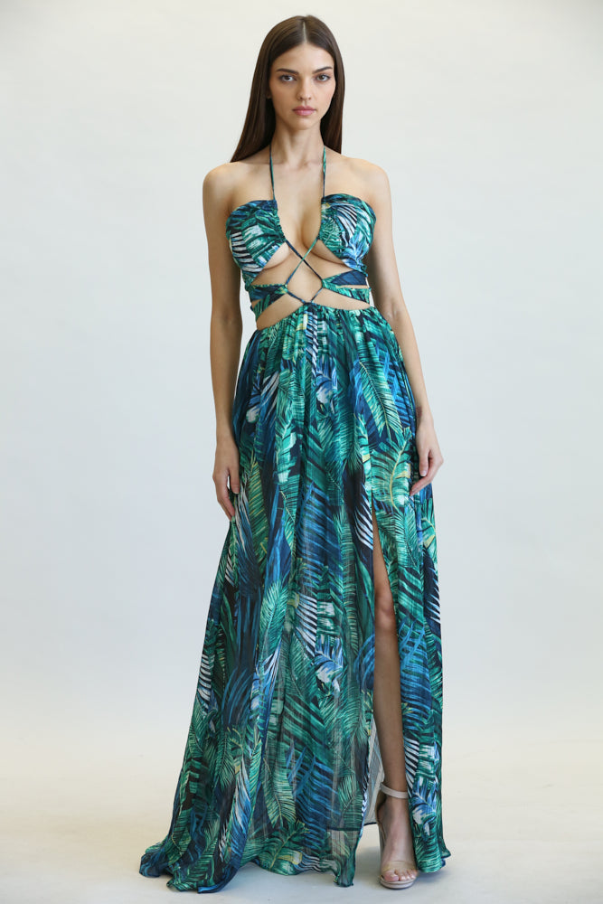 Amata Jungle Leaf Print Pattern Dress featuring a halter neckline, multi-cutout bodice, and A-line maxi skirt with a front leg slit.