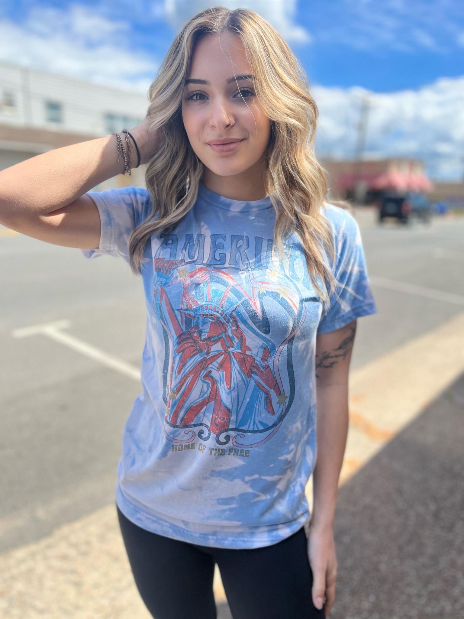 America Home Of The Free Bleach Tee featuring a unique hand-bleached design, perfect for patriotic celebrations.