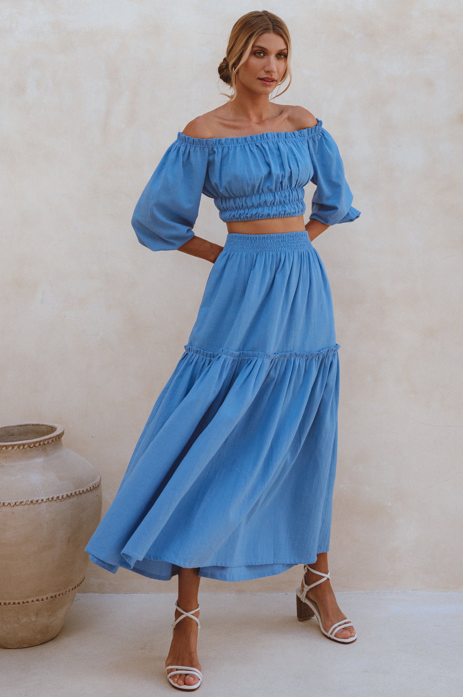 Annabelle Linen Cropped Top in crinkle linen with elasticated waist and sleeves, styled with a maxi skirt.