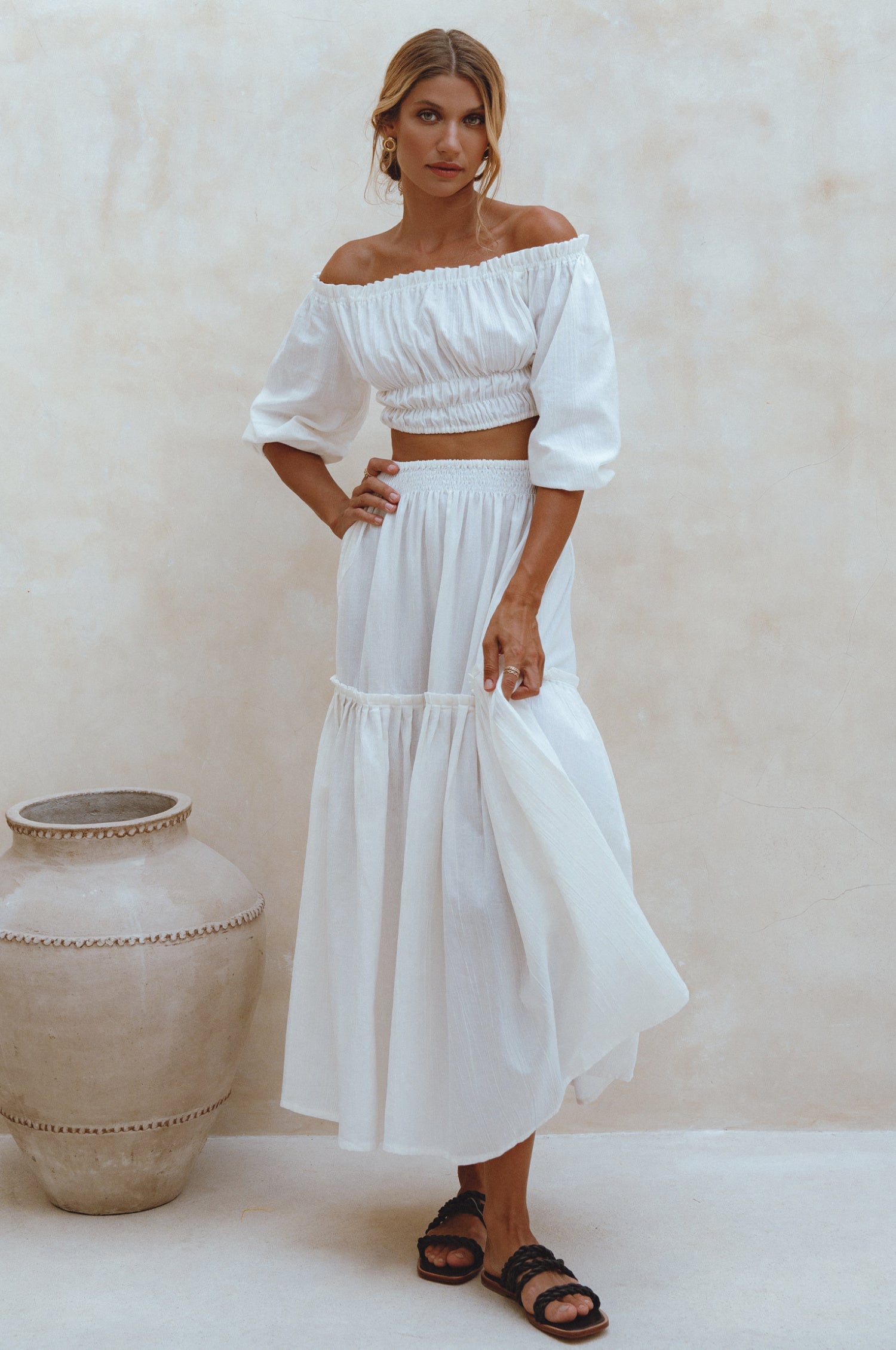 Annabelle Linen Cropped Top in crinkle linen with elasticated waist and sleeves, styled with a maxi skirt.