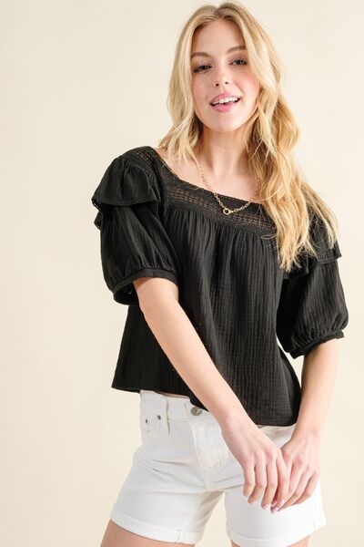 A stylish square neck cotton gauze blouse with ruffles, showcasing a feminine design in a light fabric, perfect for warm weather.