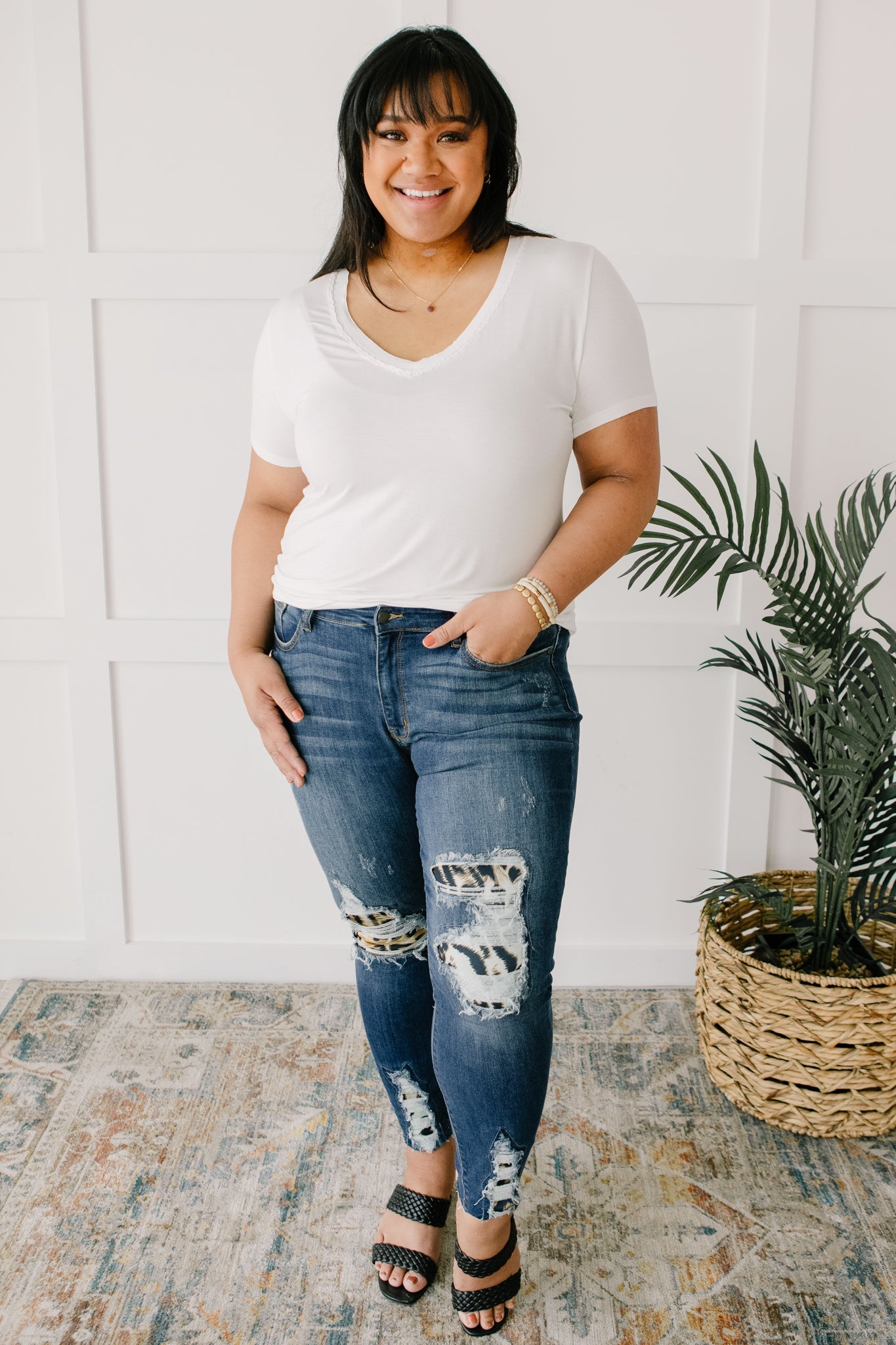 Andy Top in Ivory featuring short sleeves and lace neckline detail, perfect for casual or dressy occasions.