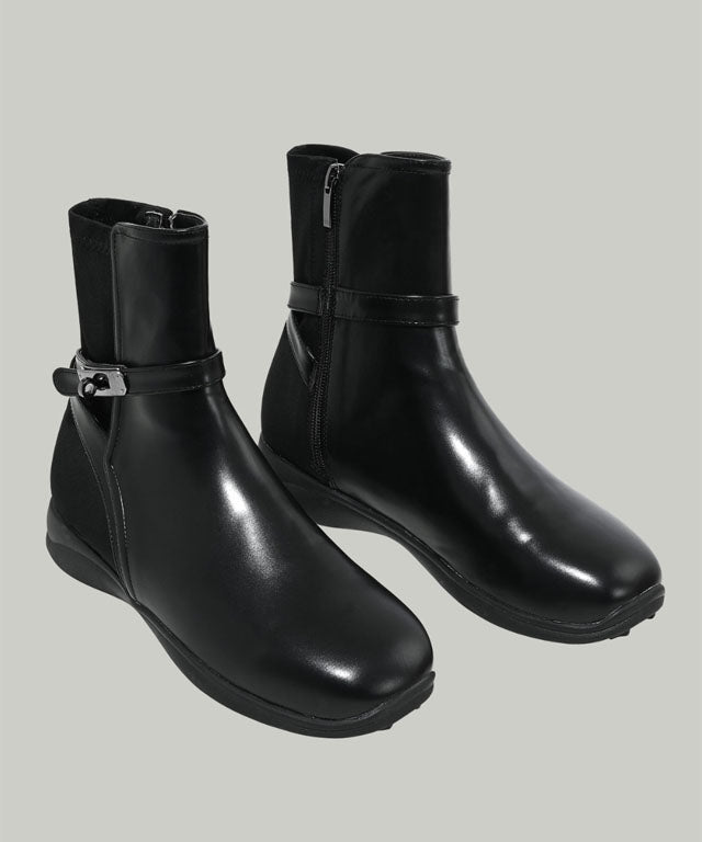 Anell Golf Classic Ankle Boots in Black, showcasing flexible faux leather and neoprene design for comfort and style on the golf course.