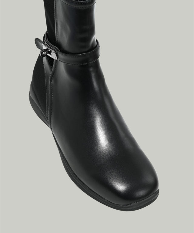 Anell Golf Classic Ankle Boots in Black, showcasing flexible faux leather and neoprene design for comfort and style on the golf course.