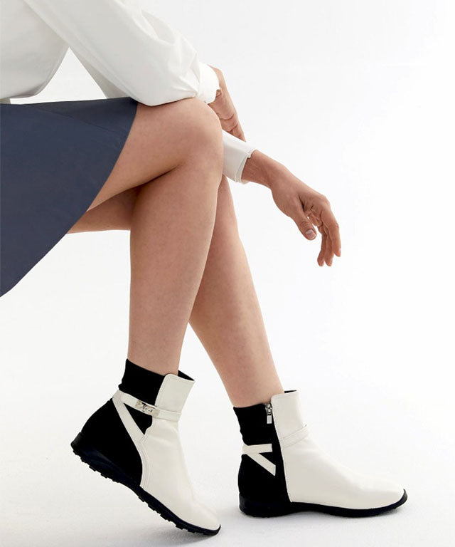 Anell Golf Classic Ankle Boots in Cream Ivory, showcasing flexible faux leather and stylish design for golfers.