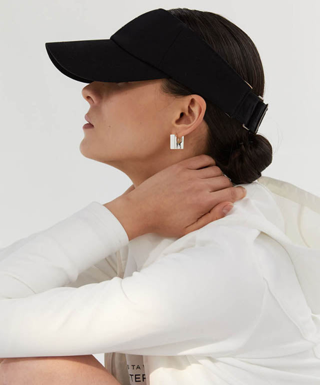 Anell Golf Comfortable Visor in Black, featuring a wide brim and embossed logo details, designed for comfort and style.