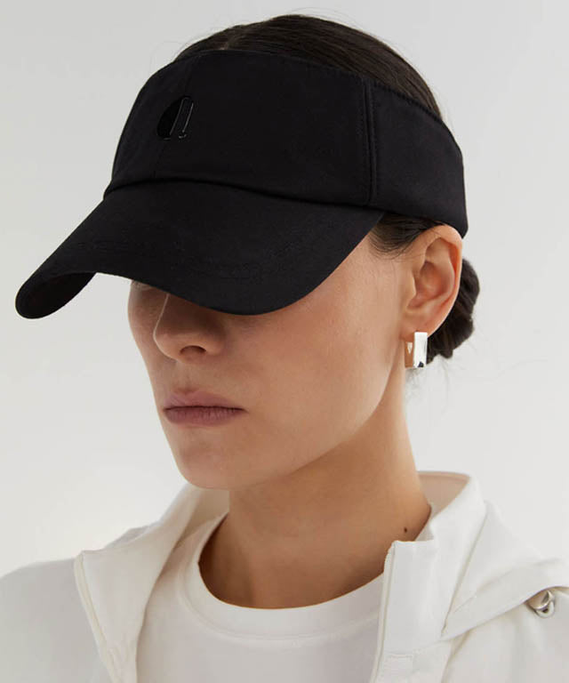 Anell Golf Comfortable Visor in Black, featuring a wide brim and embossed logo details, designed for comfort and style.