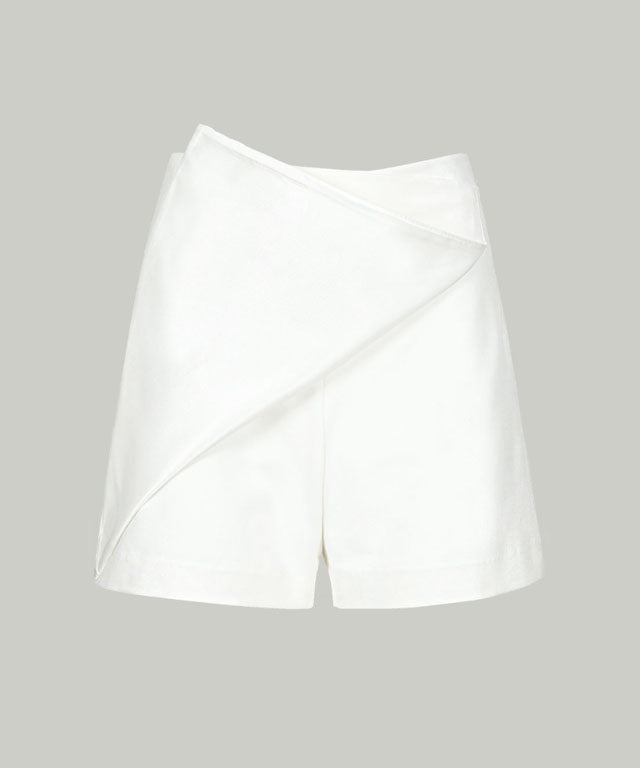 Anell Golf Cotton Wrap Skirt Pants in White, featuring a semi-A-line design with a comfortable fit and stylish diagonal slit.