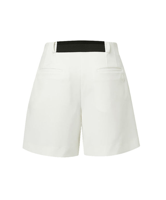 Anell Golf Flexi Flat Shorts in Basic Black, showcasing a comfortable A-line silhouette with front and back pockets.