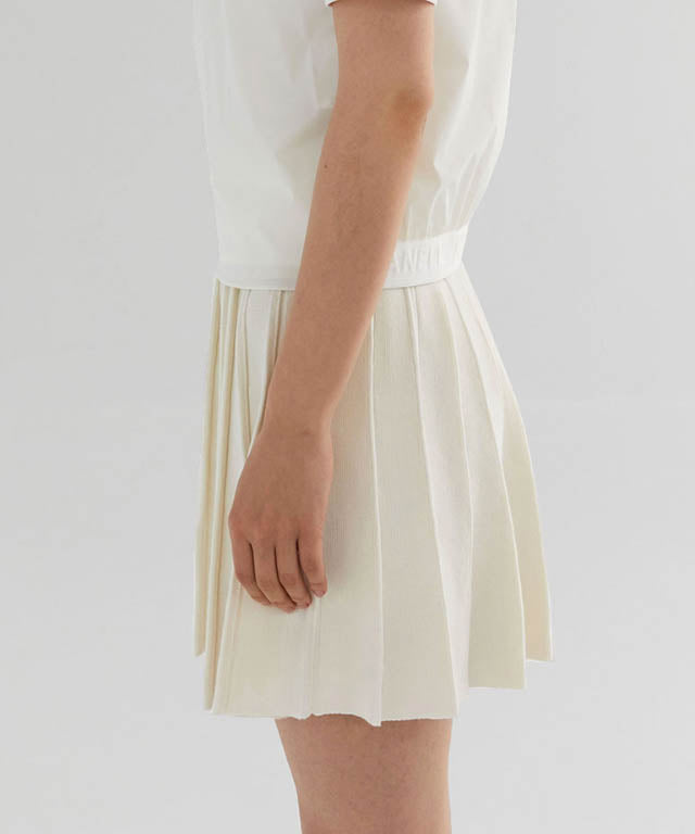 Anell Golf French Wool Skirt in Cream with pleated design and functional underpants, perfect for stylish golfing.