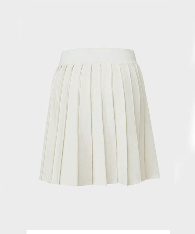 Anell Golf French Wool Skirt in Cream with pleated design and functional underpants, perfect for stylish golfing.