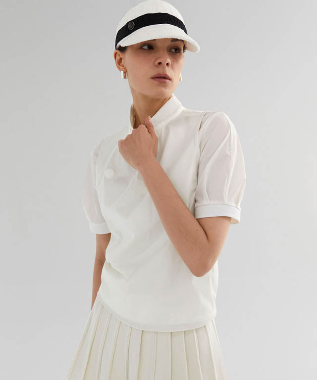 Anell Golf French Wool Skirt in Cream with pleated design and functional underpants, perfect for stylish golfing.