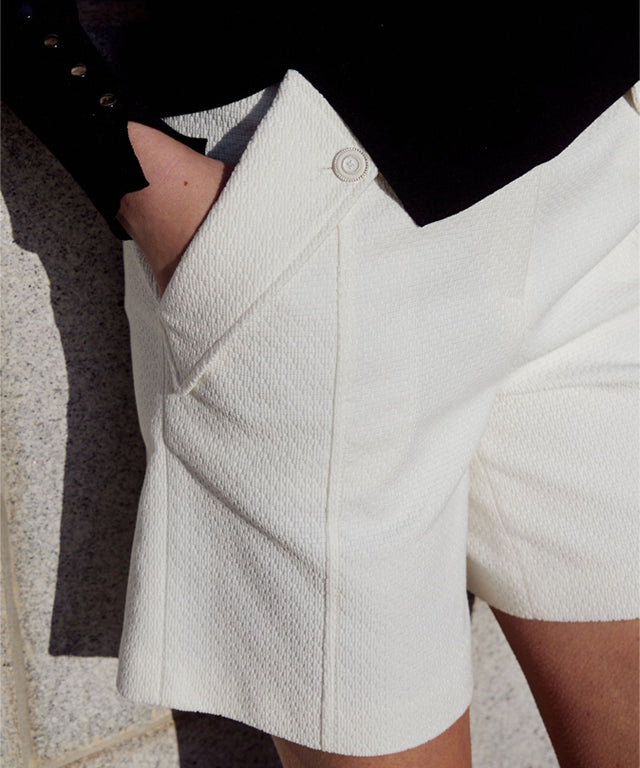 Anell Golf Limited Tweed Golf Pants in White, showcasing a luxurious tweed texture and high-end button details.