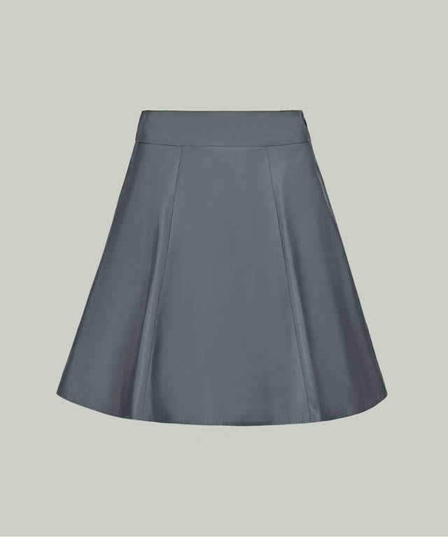 Anell Golf Slim Fit Full Skirt in Matte Blue, showcasing its voluminous flare and stylish design.