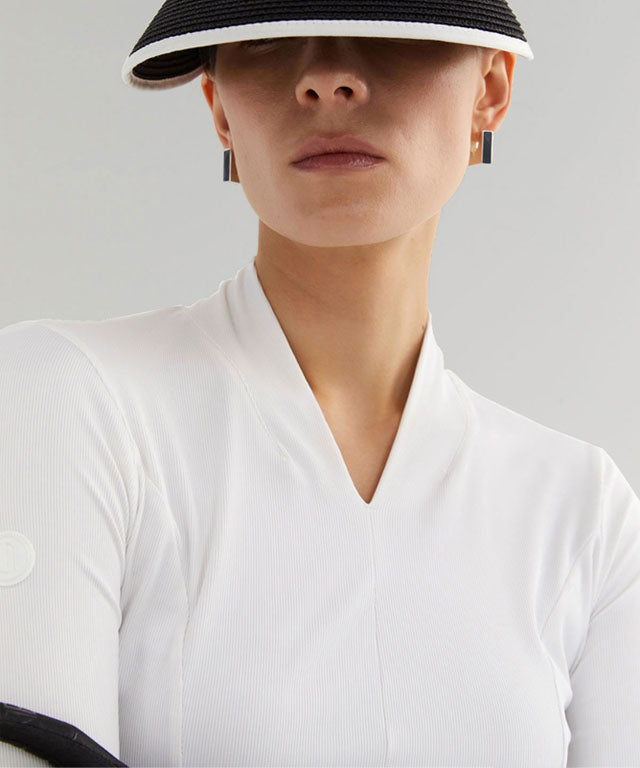 Anell Golf Soft Shawl Collar Top in White, featuring a shawl collar and V-neck design, perfect for golfers.