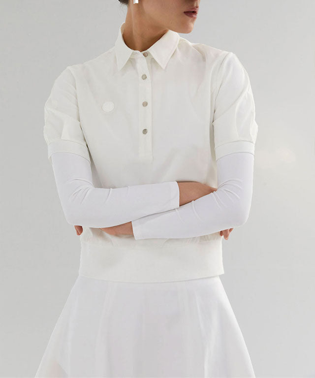 Anell Golf Soft Shawl Collar Top in White, featuring a shawl collar and V-neck design, perfect for golfers.