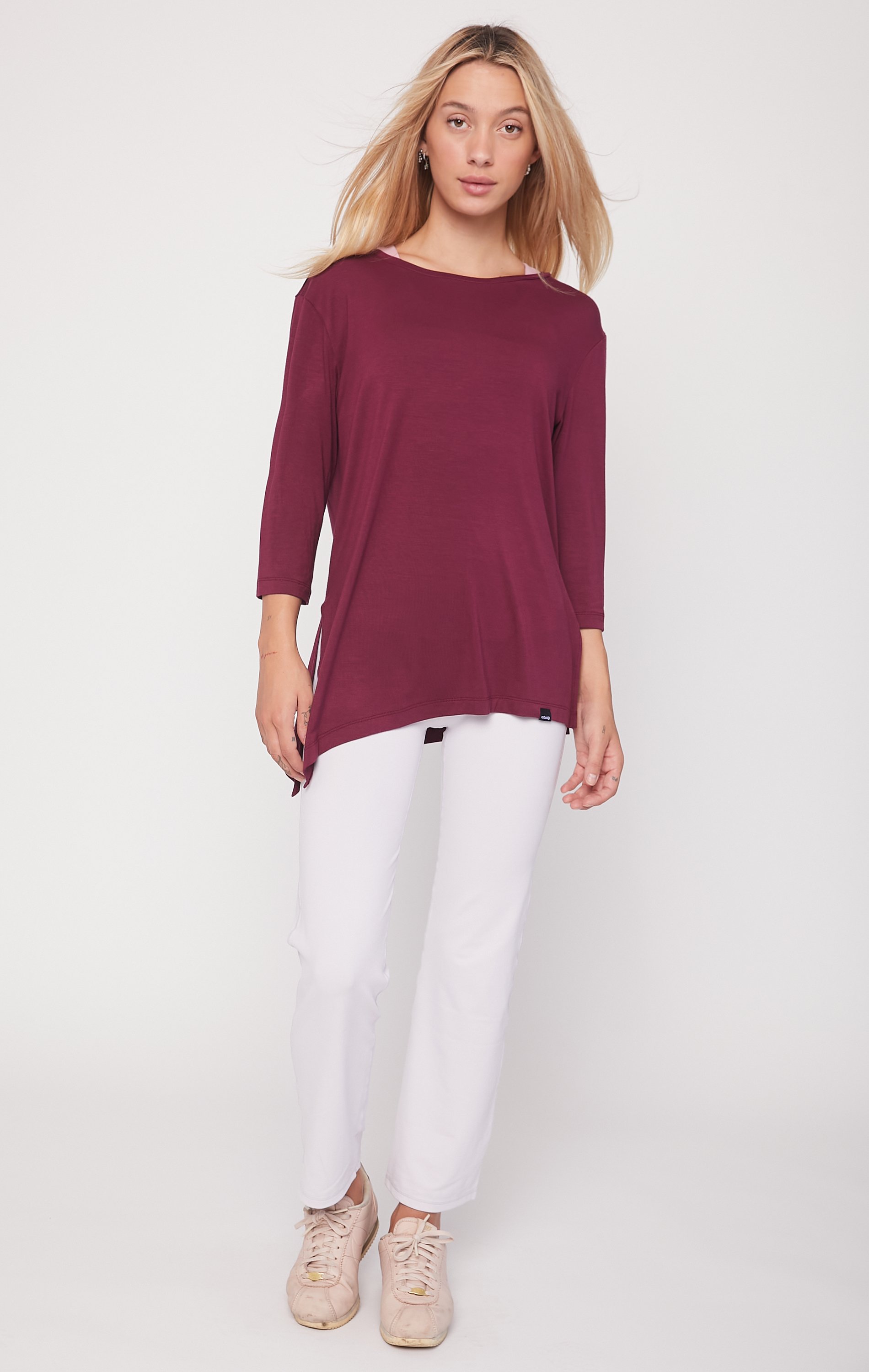 Anen Side Tie 3/4 Sleeve Top featuring a slightly elongated hem and customizable side tie design, made from cool rayon blend fabric.