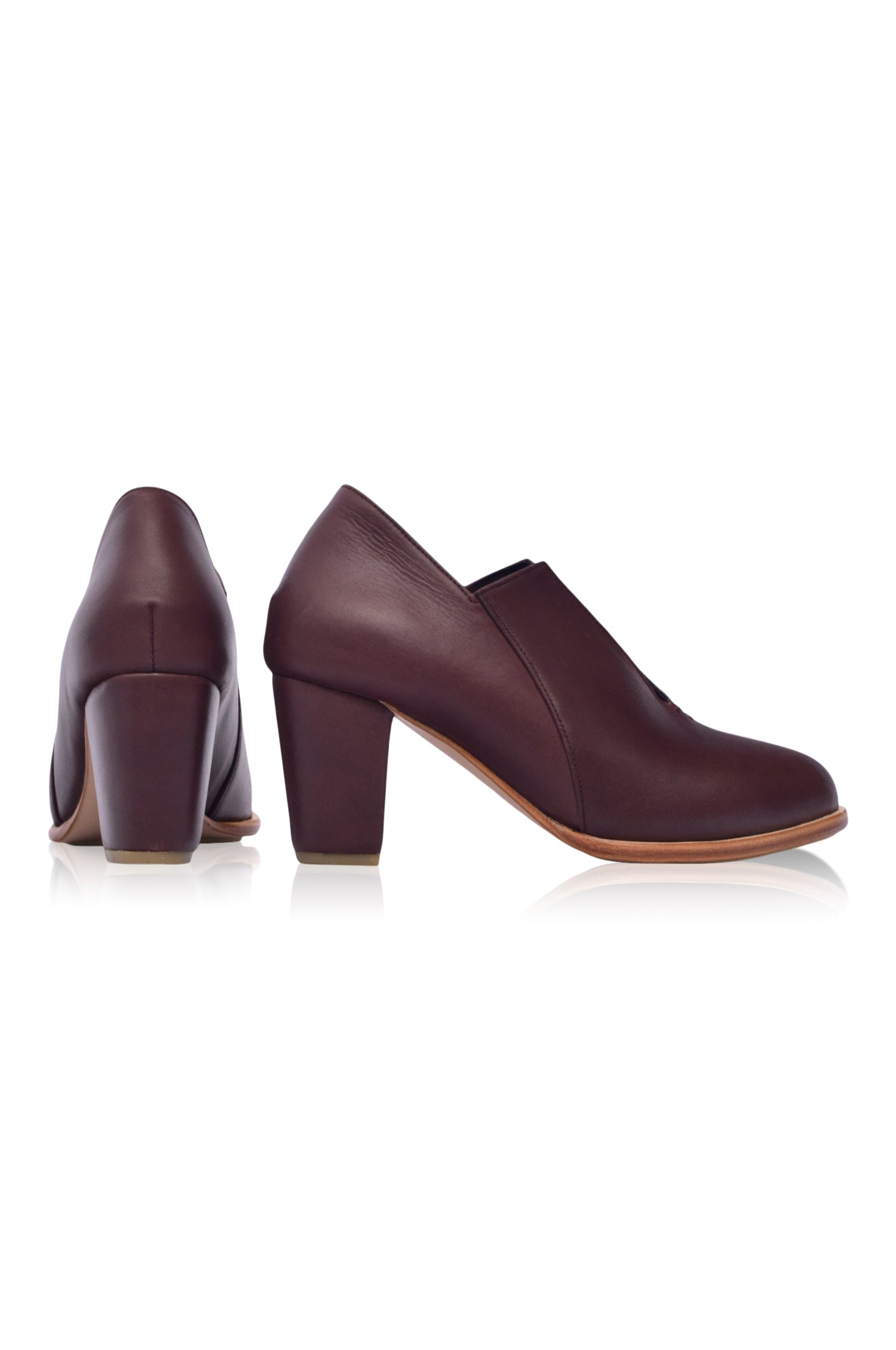 Ange Leather Heel Booties featuring a chic below-ankle design with a leather-wrapped heel and almond-shaped toe, perfect for stylish outfits.