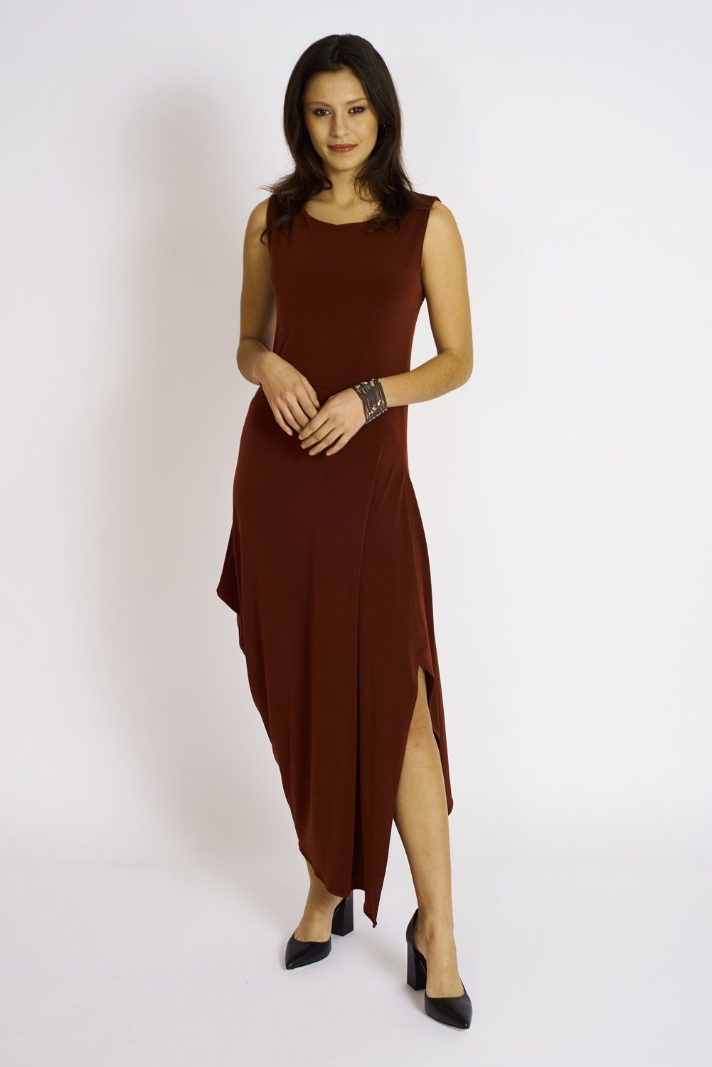 A stylish Angled Dress featuring a double layer bodice and asymmetric hem, perfect for modern fashion enthusiasts.