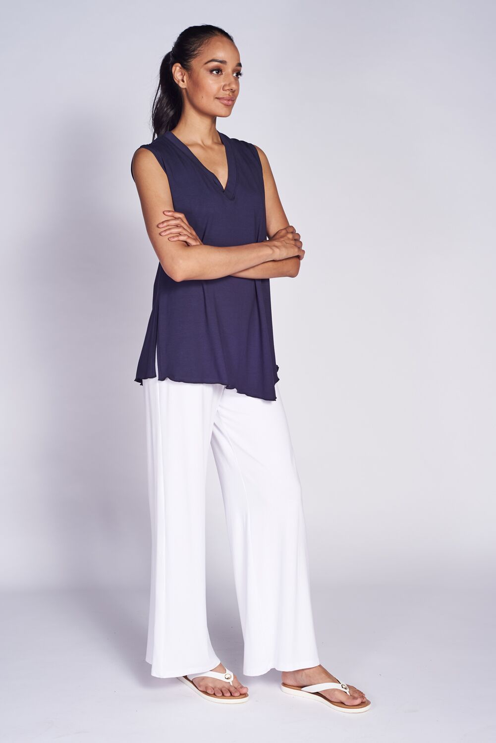 Angled Tank Top made from soft bamboo fabric, featuring wider shoulder straps and a stylish side slit for a flattering fit.