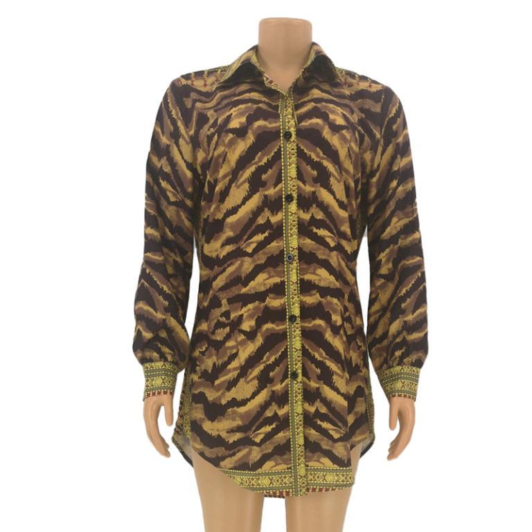 A stylish women's long sleeve A-line dress featuring an animal print design, buttons, and a turn-down collar, perfect for autumn wear.