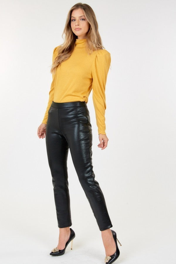 A pair of stylish black animal skin vinyl ankle pants made from polyester and spandex, showcasing a sleek and edgy design.