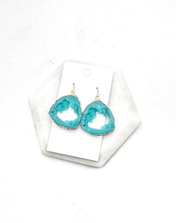 Aqua agate slice resin statement earrings with gold accents, showcasing a unique design and lightweight construction.