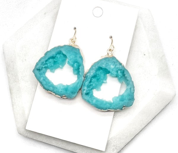 Aqua agate slice resin statement earrings with gold accents, showcasing a unique design and lightweight construction.