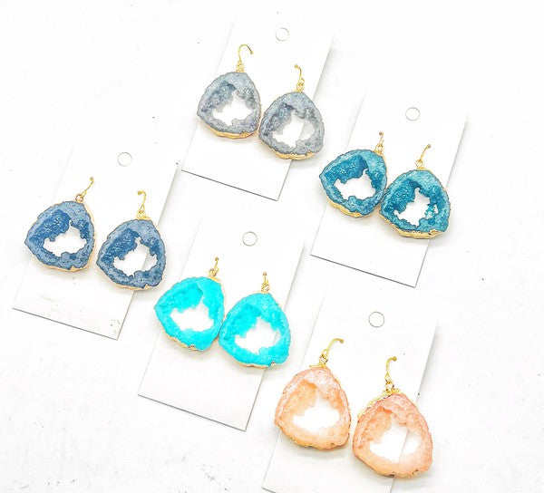 Aqua agate slice resin statement earrings with gold accents, showcasing a unique design and lightweight construction.