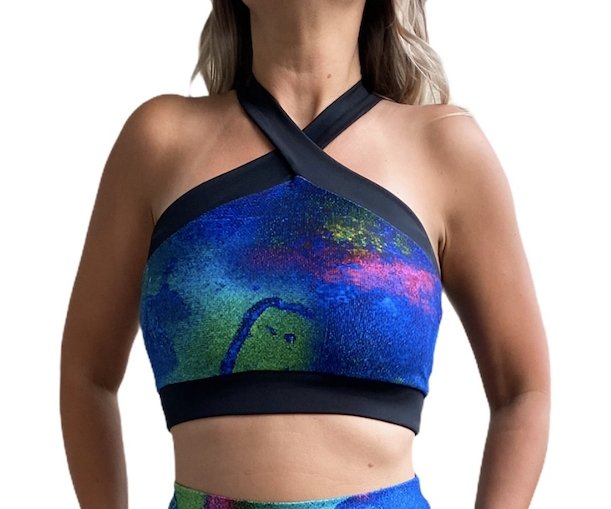 Aqua Sports Bra featuring a stylish crossed back design, high v-neck, and vibrant color, ideal for yoga, gym, and swim activities.