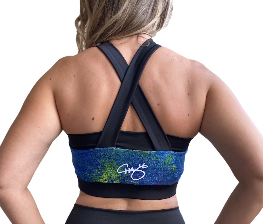 Aqua Sports Bra featuring a stylish crossed back design, high v-neck, and vibrant color, ideal for yoga, gym, and swim activities.