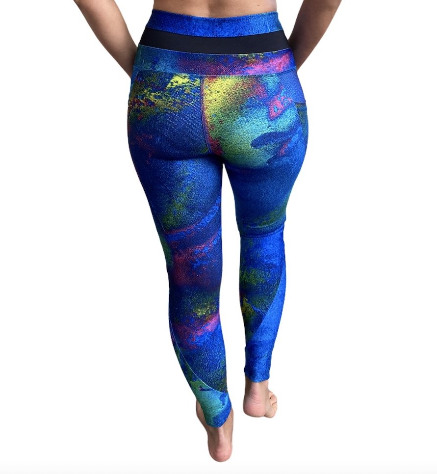 Aqua Yoga Leggings with Pockets featuring a high-rise design and vibrant hand-painted patterns, perfect for yoga and casual wear.