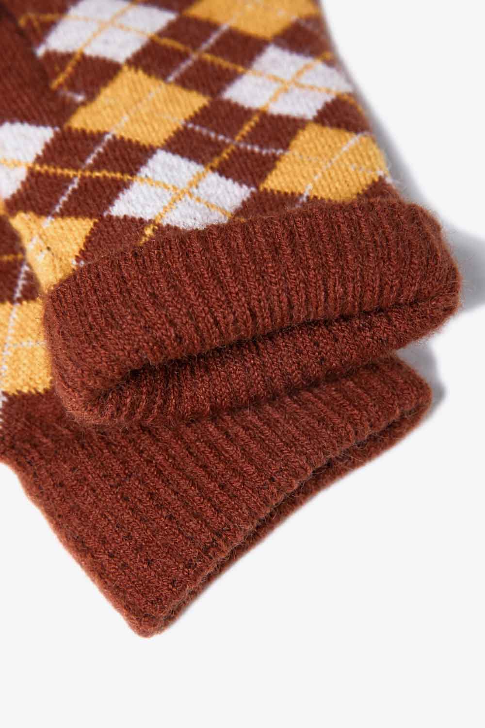 A flat lay image of Argyle Knit Gloves showcasing their stylish pattern and soft acrylic material.