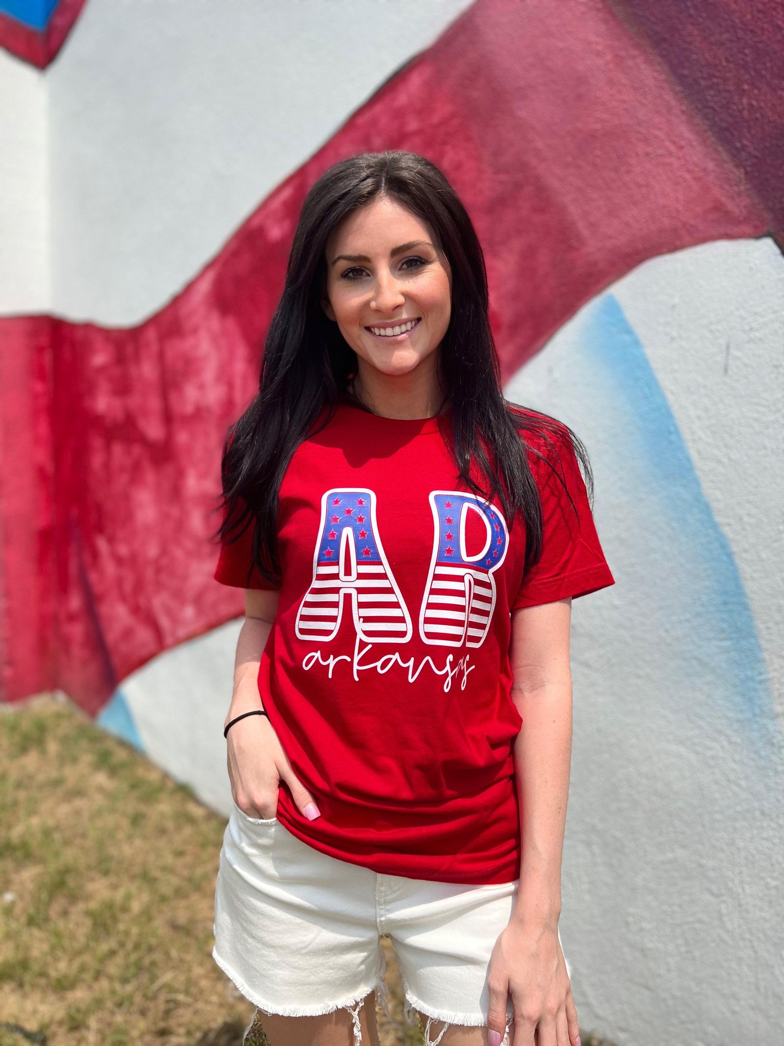 A stylish Arkansas Stars and Stripes Tee featuring vibrant colors and a comfortable fit, perfect for celebrating the 4th of July.