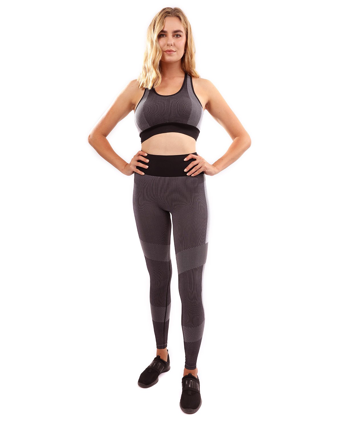 Arleta Seamless Leggings and Sports Bra Set in Black, featuring stylish black and grey detailing, perfect for workouts and casual wear.