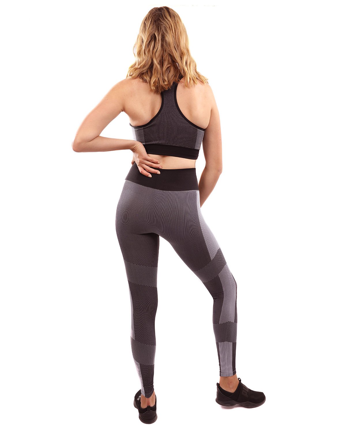 Arleta Seamless Leggings and Sports Bra Set in Black, featuring stylish black and grey detailing, perfect for workouts and casual wear.