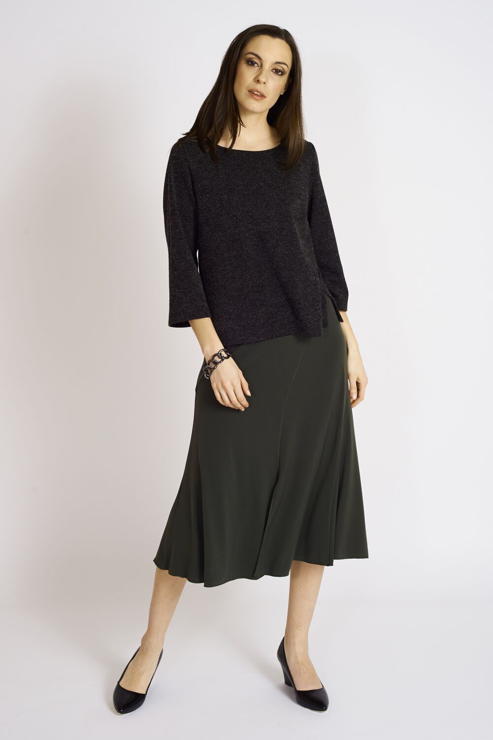 Ashmore Sweater Knit Box Top featuring a boat neck and vented sides, made from soft sweater knit fabric.