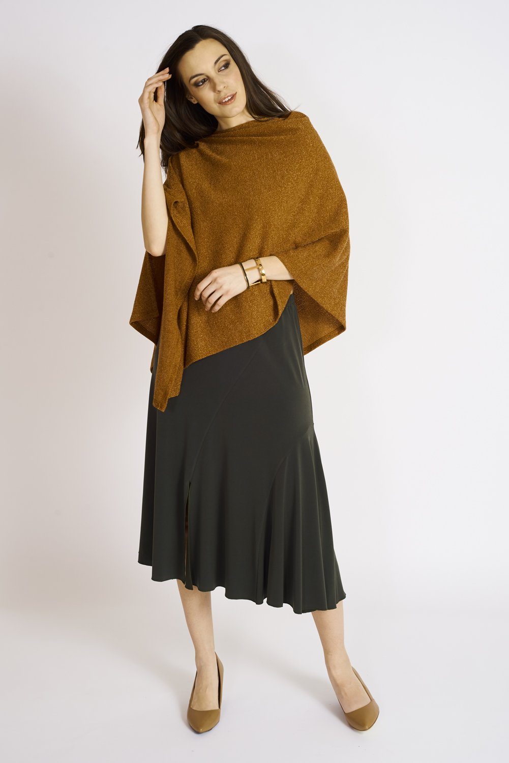 Ashmore Sweater Knit Pure Poncho in a stylish design, showcasing its lightweight fabric and elegant drape, perfect for fall wear.