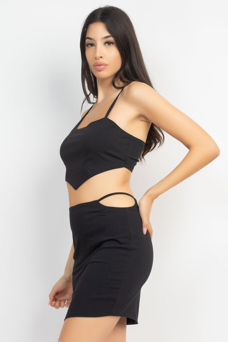 Asymmetrical Cross Back Top & Skirts Set featuring a cropped tank top and high-waisted mini skirt in solid black.