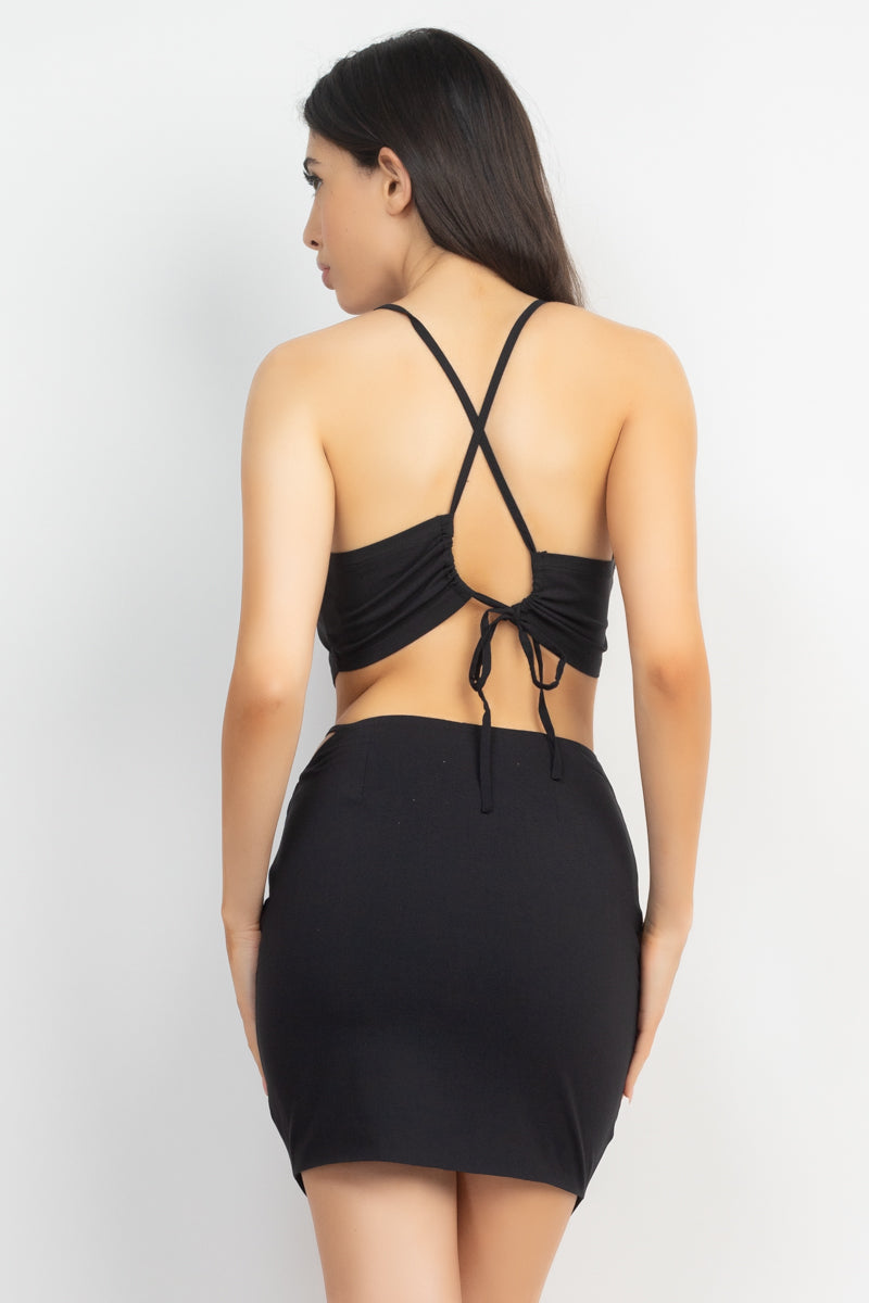 Asymmetrical Cross Back Top & Skirts Set featuring a cropped tank top and high-waisted mini skirt in solid black.