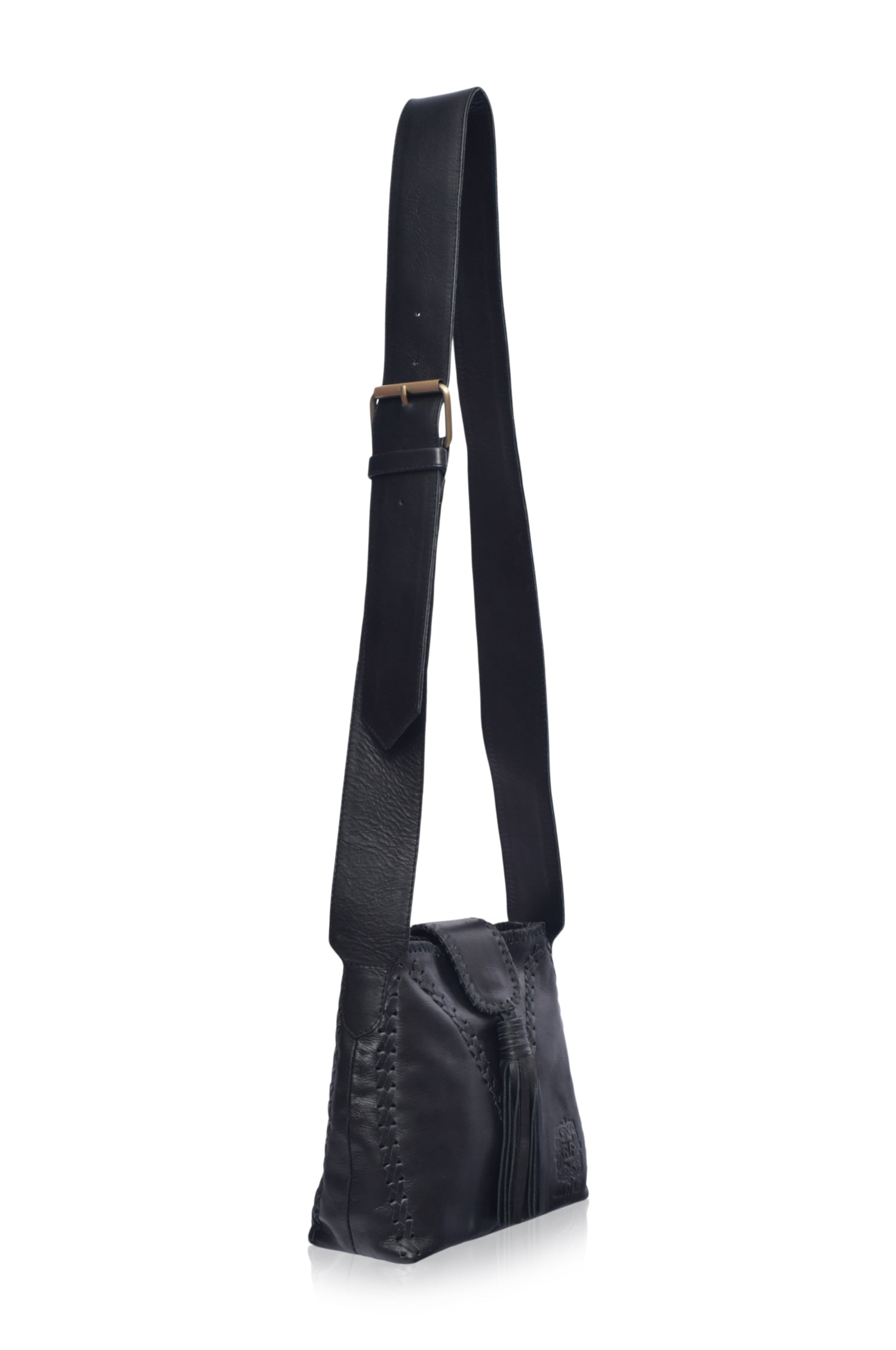 Atacama Small Crossbody Bag made of high-quality leather with intricate stitching, featuring an adjustable strap and spacious interior.