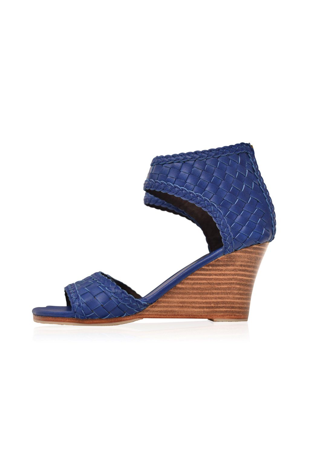 Athena Leather Wedges showcasing woven leather design with braided detailing and a wooden wedge heel.